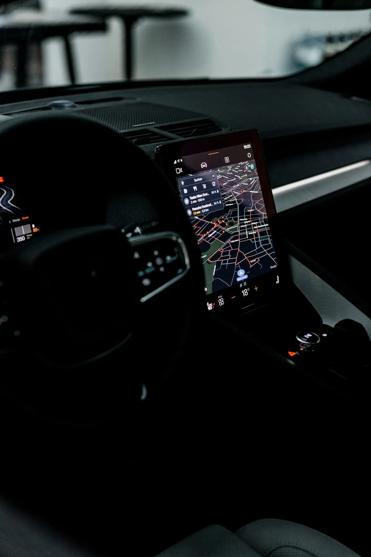 GPS telematics device mounted on a vehicle dashboard